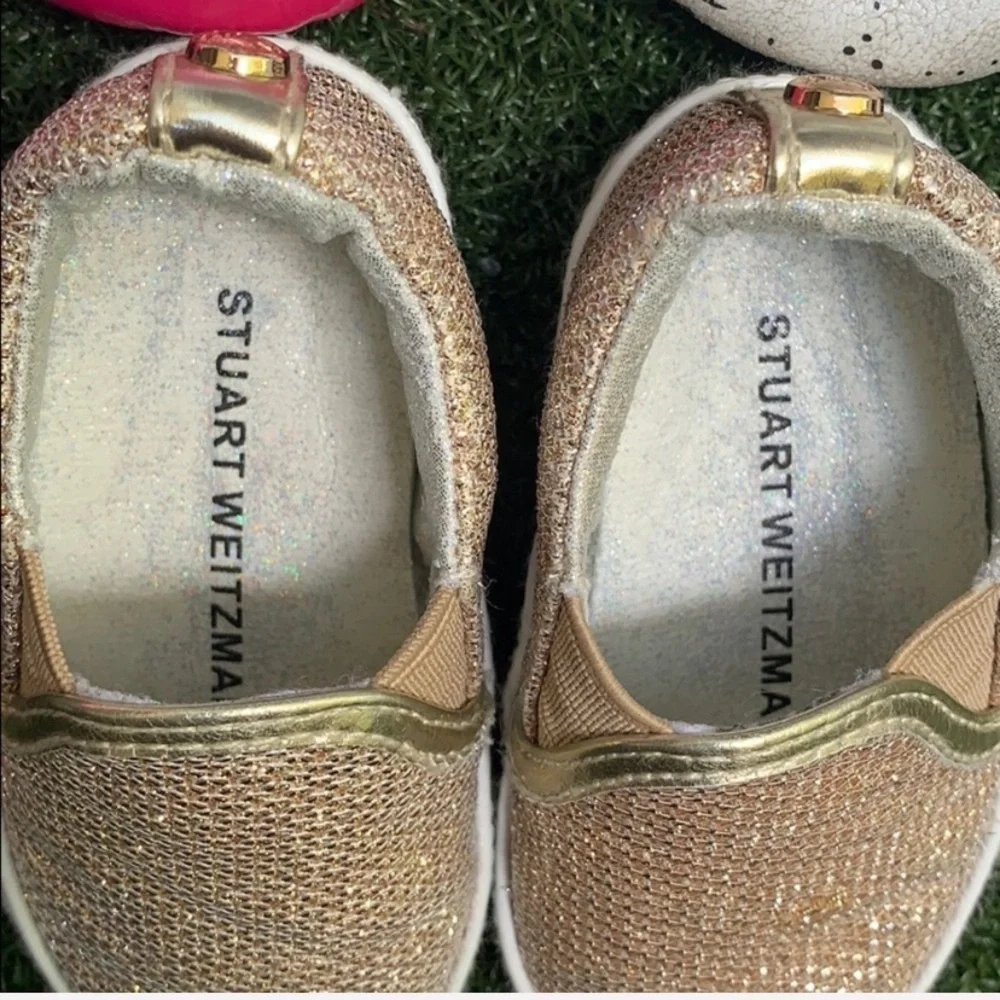Stuart Weitzman gold shimmer slip ons